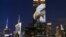 An image of an animal is projected onto the Empire State Building as part of an endangered species projection to raise awareness, in New York, Aug. 1, 2015. 