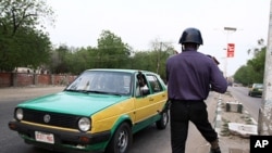 Wani dan sanda na aikin tsaro a Maiduguri.