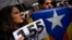 People gather at Plaza Consistorial square during a protest against Article 155 of the Constitution, which gives the central government extra powers to re-establish the rule of law in a region, in Pamplona, northern Spain, Spain, Nov. 5, 2017. 