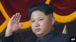 FILE - North Korean leader Kim Jong Un gestures as he watches a military parade in Pyongyang, North Korea.