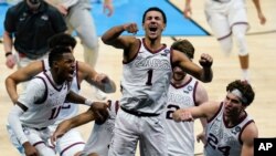 Gonzaga guard Jalen Suggs (1) celebrates making the game winning basket against UCLA during overtime in a men's Final Four NCAA college basketball tournament semifinal game, April 3, 2021, at Lucas Oil Stadium in Indianapolis, Indiana.