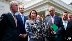 Speaker of the House Nancy Pelosi of Calif., talks with reporters after meeting with President Donald Trump about infrastructure, at the White House, April 30, 2019, in Washington.