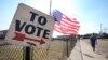 FILE—A voter walks to a Michigan primary election location in Dearborn, Michigan, February 27, 2024. 