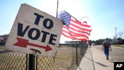 FILE—A voter walks to a Michigan primary election location in Dearborn, Michigan, February 27, 2024. 