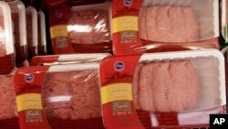 FILE - These products displayed in a Redwood City. Calif., grocery store were subject to meat giant Cargill's recall of 36 million pounds of ground turkey linked to a nationwide salmonella outbreak, Aug. 3, 2011.