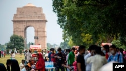 People gather at a park near India Gate to celebrate the country's 74th Independence Day in New Delhi on Aug. 15, 2020. 