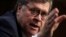 FILE - William Barr testifies before a Senate Judiciary Committee hearing on his nomination to be attorney general of the United States on Capitol Hill in Washington, Jan. 15, 2019.