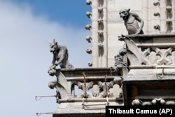 FILE - Preserved gargoyles of Notre-Dame de Paris cathedral are pictured, on April 17, 2019 in Paris. (AP Photo/Thibault Camus, File)