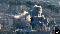 Smoke rises from Israeli airstrikes on Choueifat town, southern Beirut, Lebanon, Oct. 19, 2024.