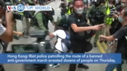 VOA60 Addunyaa: Riot police in Hong Kong patrolling a banned anti-government march arrested dozens of people