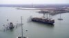 Aerial view of the Dali cargo vessel which crashed into the Francis Scott Key Bridge, causing it to collapse in Baltimore, Maryland, March 26, 2024. (Maryland National Guard/Handout via REUTERS).