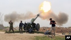 Ảnh tư liệu: Lực lượng an ninh Iraq tấn công các chiến binh Nhà nước Hồi giáo từ ngôi làng phía nam của thành phố Mosul, Iraq.
