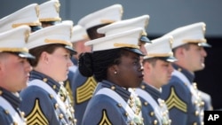 (File) West Point cadets stand at their seats at the start of graduation ceremonies at the United States Military Academy, May 25, 2019, in West Point, N.Y.
