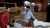An injured victim of mosque bombing, is brought to hospital in Quetta, Pakistan, Jan. 10, 2020. 
