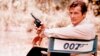 FILE - British actor Roger Moore, playing the title role of secret service agent 007, James Bond, is shown on location in England in 1972. Moore, played Bond in seven films, more than any other actor. Roger Moore's family said Tuesday May 23, 2017 that t