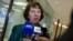 FILE - European Union High Representative Catherine Ashton speaks with the media as she arrives for a meeting of EU Foreign Ministers in Luxembourg.