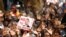 Supporters of the opposition Movement For Democratic Change (MDC) party take part in anti-government protests over economic hardships in Harare, Zimbabwe, Nov. 29, 2018.