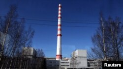 FILE - A view through a bus window shows the Leningrad Atomic Power Station in Sosnovyi Bor, 90 km (56 miles) west of St. Petersburg, April 5, 2011.
