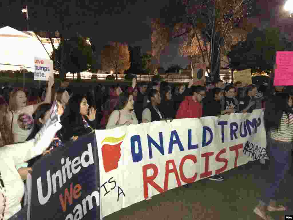 Demonstrators protesting the election of Donald Trump chanted “Undocumented and unafraid” as they marched near the White House in Washington, D.C., Nov. 10, 2016. (Jesusemen Oni/VOA)