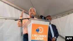 FILE - Prime Minister of Mauritius and candidate for the Militant Socialist Movement (MSM) Pravind Jugnauth (C) delivers his speech during a campaign rally in Mahebourg, Oct. 20, 2024, ahead of the general election.