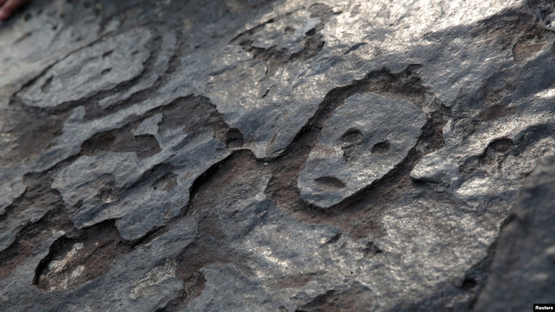 Dry Weather Uncovers Stone Designs under Amazon River