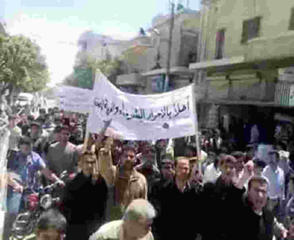 A video still taken from YouTube shows Syrians demonstrating in Kofr Bel on May 6, 2011, a "Day of Defiance" in which thousands rallied as President Bashar al-Assad's regime deployed tanks in at least three centers of an uprising against his rule