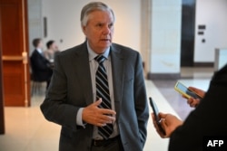 FILE - US Republican Senator from South Carolina Lindsey Graham arrives for a biefing for senators on the Israel-Hamas conflict at the US Capitol in Washington, DC, on October 18, 2023.