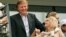 FILE - Developer Donald Trump talks with his former wife Ivana Trump during the men's final at the U.S. Open. 