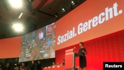 FILE - Then-Top candidate of Germany's left-wing party Die Linke Sahra Wagenknecht delivers a speech during a party congress in Hanover, Germany, June 11, 2017. 