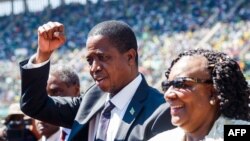 Le président zambien Edgar Lungu arrive pour la cérémonie officielle d'investiture d'Emmerson Mnangagwa en tant que président du Zimbabwe à Harare, le 26 août 2018.