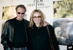 FILE - Sam Shepard and Jessica Lange as they arrive to the premiere of his film, "Walker Payne," during the Tribeca Film Festival in New York, April 26, 2006.