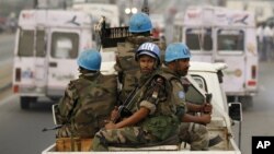 United Nations soldiers from Niger conduct a patrol through the streets of Abidjan, Ivory Coast (2011 file photo).