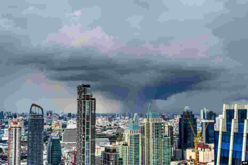 A cumulonimbus cloud is seen over Bangkok&#39;s skyline, Thailand.