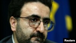 FILE - Mostafa Tajzadeh, a senior member of the reformist Islamic Iran Participation Front, speaks with journalists at a news conference in Tehran, Feb. 21, 2004. 