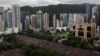 Гонконг: новая акция протеста под проливным дождем