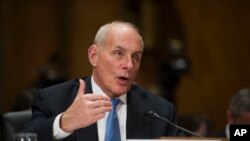 Retired Marine Gen. John F. Kelly testifies during the Senate Homeland Security Committee hearing on his confirmation to be Secretary of Homeland Security in Washington, Tuesday, Jan. 10, 2017. (AP Photo/Cliff Owen)