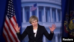 Britain's Prime Minister Theresa May arrives to speak during the 2017 "Congress of Tomorrow" Joint Republican Issues Conference in Philadelphia, Pennsylvania, Jan. 26, 2017. 