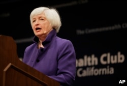 FILE - Federal Reserve Board Chair Janet Yellen addresses a meeting of the Commonwealth Club in San Francisco, Jan. 18, 2017.