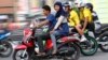Women Banned from Straddling Motorbikes
