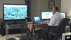 Omar Afifi Suleiman directs Egyptian demonstrations from his high tech command center near Washington, D.C.