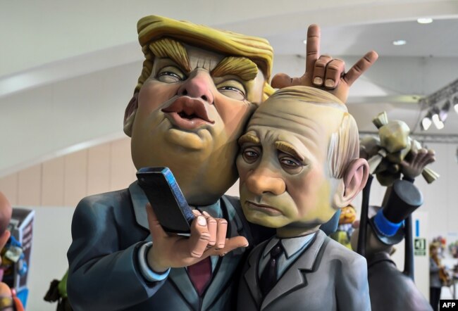 A Ninot, a doll depicting a celebrity that will be set alight during the Fallas festival, representing U.S. President Donald Trump and Russian President Vladimir Putin is displayed in Valencia on March 09, 2018.