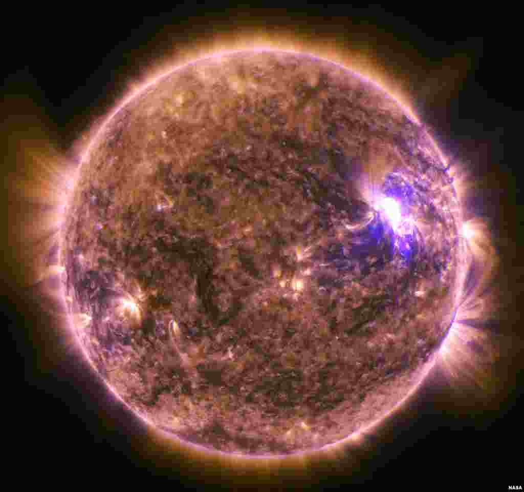 In this image captured by NASA&rsquo;s Solar Dynamics Observatory the sun emits a mid-level solar flare, an M7.9-class, peaking at 4:16 a.m. EDT.