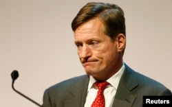 CEO Dougan Brady of Swiss bank Credit Suisse attends the company's annual shareholder meeting in Zurich, Switzerland, May 9, 2014.