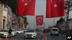 A main street decorated with Turkish flags near the Reina club four days after the New Year's attack, in Istanbul, Jan. 4, 2017. 