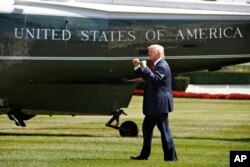 President Donald Trump walks on the South Lawn of the White House in Washington, Aug. 4, 2017, to board Marine One helicopter for a short trip to Andrews Air Force Base, Maryland, en route to Bedminster, N.J., for vacation.