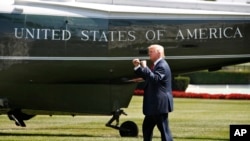 President Donald Trump walks on the South Lawn of the White House in Washington, Aug. 4, 2017, to board Marine One helicopter for a short trip to Andrews Air Force Base, Maryland, en route to Bedminster, N.J., for vacation.