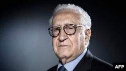 FILE - Former United Nations and Arab League Special Envoy to Syria, Lakhdar Brahimi poses during a photo session in Paris on Dec. 11, 2017.