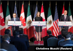 FILE - Ildefonso Guajardo, Mexico's Secretary of Economy; Chrystia Freeland, Canada's Minister of Foreign Affairs; and Robert Lighthizer, United States Trade Representative, make statements to the media in Montreal, Quebec, Canada, Jan. 29, 2018.