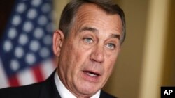 FILE - House Speaker John Boehner denounces executive order on immigration.