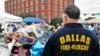 A Grieving Dallas Blankets Police Cars in Flowers, Notes